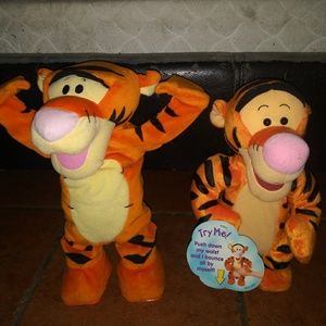Two collectible animated Tigger toys